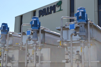Custom-fabricated ENTank™ system with external filter chambers, sloped bottom, and solution agitation tailored for specialized applications.