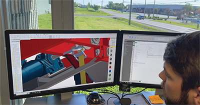 Palm Technology's Engineer working on a hoist design for a surface finishing plating line.  Working in solidworks 3D